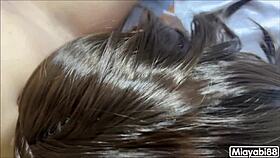 Asian student slut moans loudly while sucking big cock in school uniform, fearing exposure