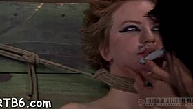 Clamped Chick Receives Lusty Facial Castigation