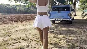 Monika Fox shamelessly shows tits and pees outdoors by a tree