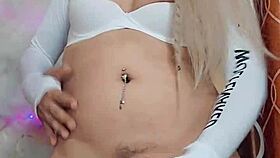 Is this rica blanca transsexual crossdressing while jerking a cock?