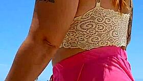 African babe flashes big pussy lips at beach lover