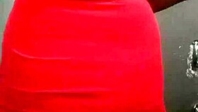 This fat booty tranny struts in a dress, looking sexy and ready