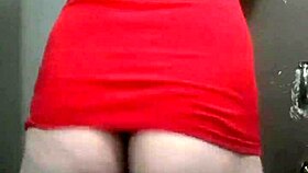 This fat booty tranny struts in a dress, looking sexy and ready