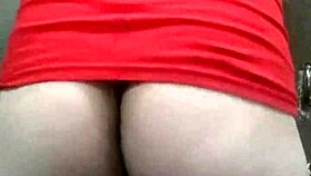 This fat booty tranny struts in a dress, looking sexy and ready