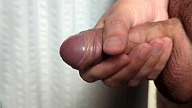 an amateur enjoys a close-up solo masturbation in the early morning light