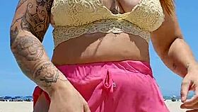 African babe flashes big pussy lips at beach lover