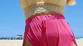 African babe flashes big pussy lips at beach lover