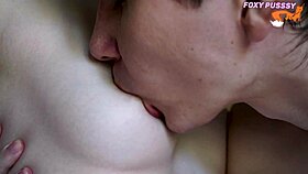Close-up big tits licked with tongue on hard nipples