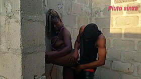 submissive black slave in outdoor bondage domination