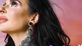 Angel Joanna Angel strips naked, showing off her sexy tattoos.