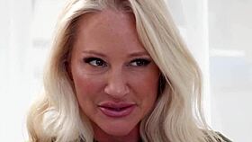 Alexis Malone, busty blonde masseuse, seduces Victor Ray with nuru gel.