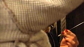 Horny madame fingers bent-over lesbian slave's wet pussy