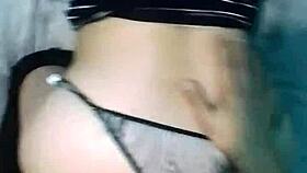 In a homemade webcam setup, a Latina emo milf shares a POV moment on a big bed using a notebook for connection.