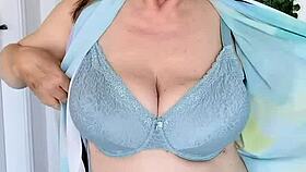 busty granny mariaold teases with strip dance in stockings and mint lingerie close-up