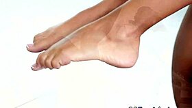 babe experiencing foot tugging in european setting.