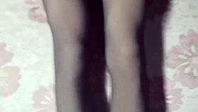 asian crossdresser strokes hard in black pantyhose and jeans.