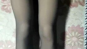 asian crossdresser strokes hard in black pantyhose and jeans.