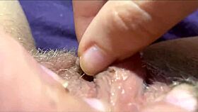 a close-up view of her vaginal orgasm during masturbation