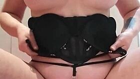 this lingerie babe masturbates hard with a buttplug for double penetration orgasm.