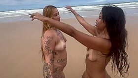 Friends fuck on beach admiring nature