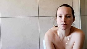 cute babe smoking in the bathroom with neighbors around