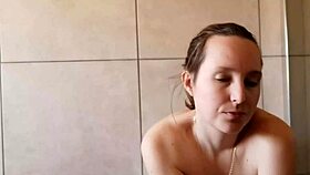 cute babe smoking in the bathroom with neighbors around