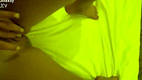 jinxxxy touches herself groping tits on bed at home