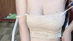 Glassed Vietnamese Girl Teases with Solo Play—What’s She Hiding?