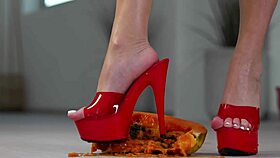 Petite girl crushes fruits with high heels hot footfetish