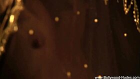 An Indian goddess gracefully undresses, teasing with her nude body