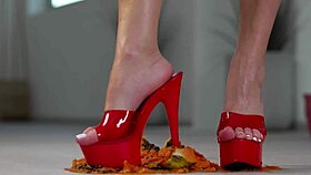 Petite girl crushes fruits with high heels hot footfetish