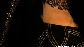 An Indian goddess gracefully undresses, teasing with her nude body