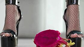 Petite girl crushes fruits with high heels hot footfetish