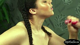 Big tits beauty sucks jizz-covered cock