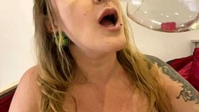 Chubby milf with tattoos talks dirty while swallowing gummy bears in vore fetish
