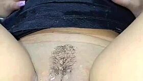 Look, this hot Colombian redhead masturbates with a dildo, showing big tits