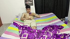 Young Colombian guy jerks off to porn on his phone, and his hot stepmom helps out 😏