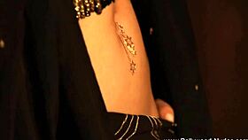 An Indian goddess gracefully undresses, teasing with her nude body