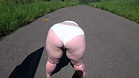 Girlfriend fucks milf with strap-on outdoors!