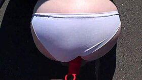 Girlfriend fucks milf with strap-on outdoors!