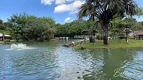 Tour guide and traveler explore park, find intimate spot for close-up homemade fun