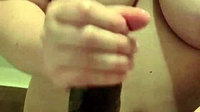 Big titty white girl gives handjob and swallows cumshot