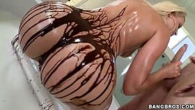 blonde with big ass covered in chocolate syrup gets licked