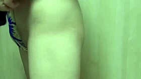 Gorgeous asian model in gold leotard undergoes long buttplug training session