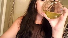 Goth girl drinks something unusual in a narrative