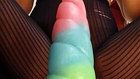 she's riding the bad dragon dildo with her hairy wet pussy in close up