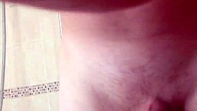 Bashing those big balls and stroking a nice cock too.