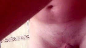 Bashing those big balls and stroking a nice cock too.