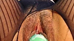 she's riding the bad dragon dildo with her hairy wet pussy in close up