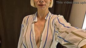 Big tits flash in dressing room with sexy see-through outfit on!